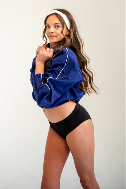 Girl wearing period and incontinence dance briefs